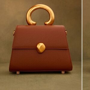 Elegant Khoi Brown/Rust  Handbag with Gold Accents.  BOX NOT INCLUDED